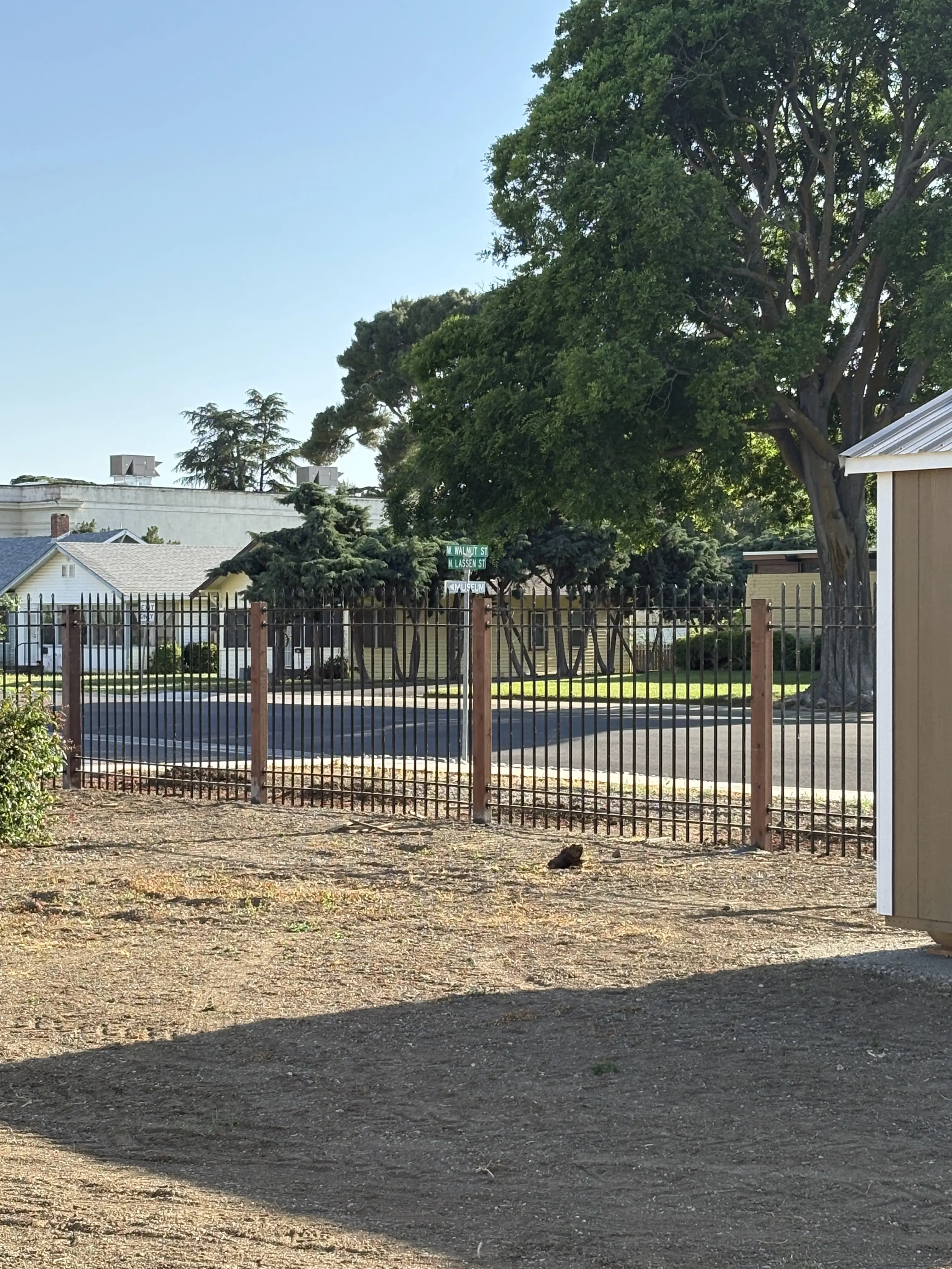 Newly installed fence securing a residential property